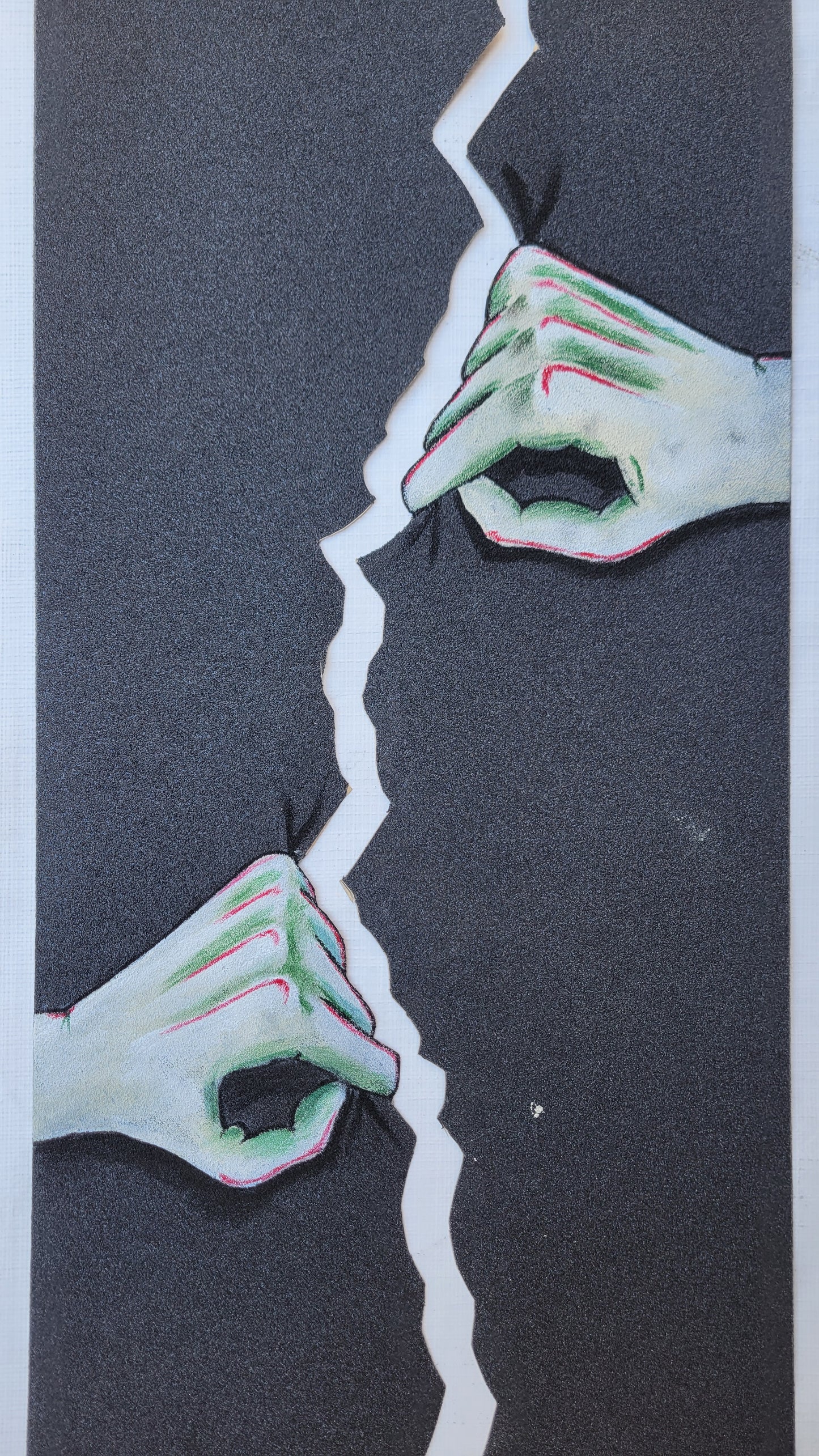 Hands Tearing grip tape sheet